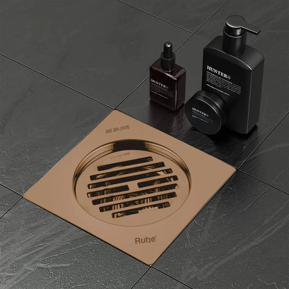 Classic Square Flat Cut Floor Drain in Antique Copper PVD Coating (5 x 5 Inches) installed