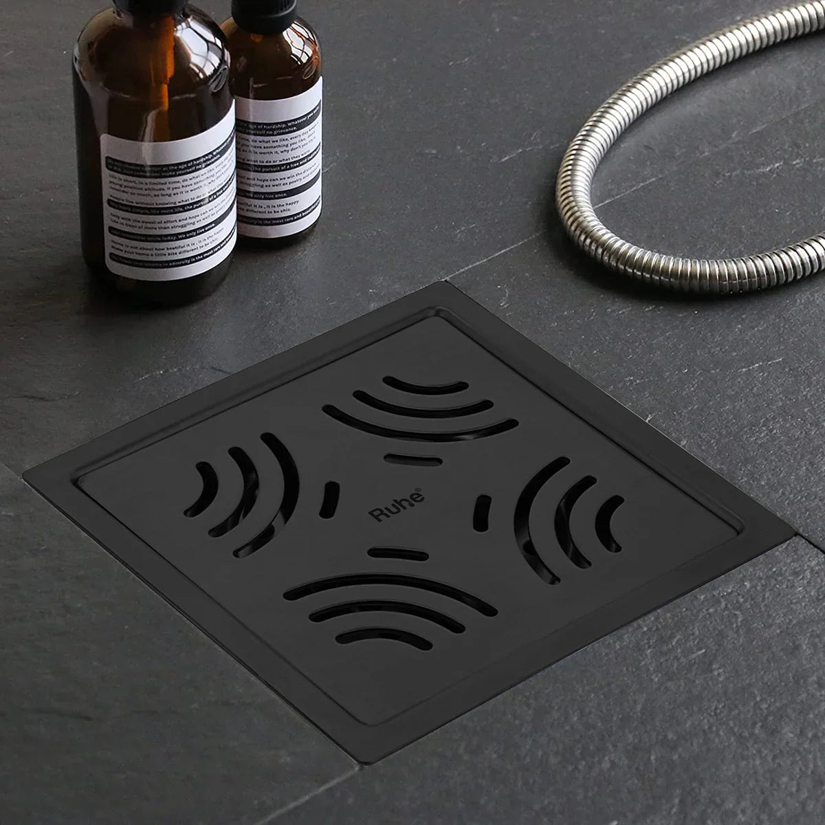 Emerald Square 304-Grade Floor Drain in Black PVD Coating (6 x 6 Inches) installed